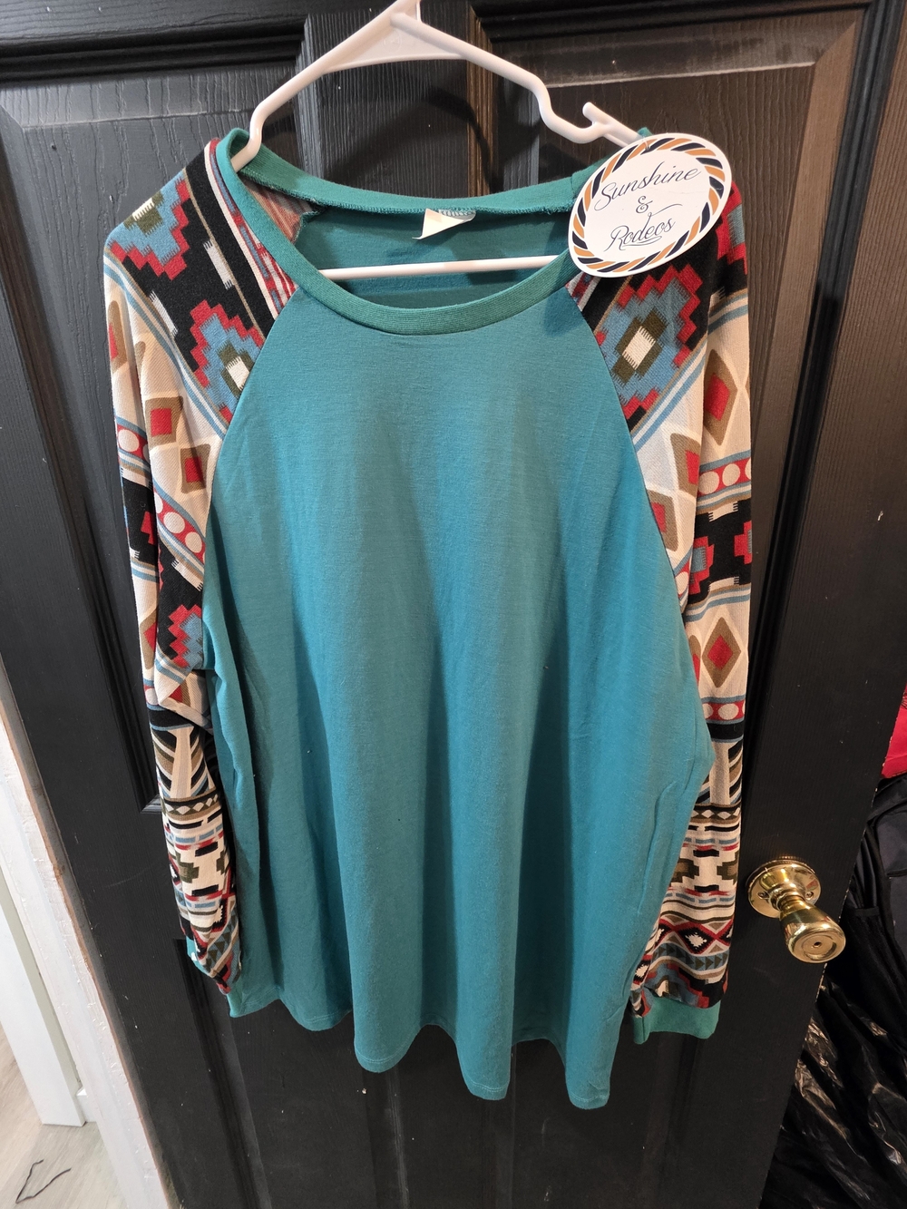 Sunshine & Rodeos Teal Raglan Long Sleeve Top with Patterned Sleeves